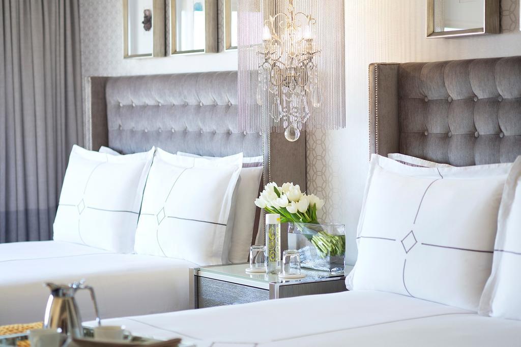 Premier Kamer met 2 Queensize Bedden en Uitzicht op de Oceaan